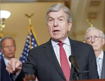  ?? AP photo ?? Sen. Roy Blunt, R-Mo. (center), Senate Minority Leader Mitch McConnell of Ky. (right), and Sen. John Thune, R-S.D. (left), speaks during a news conference at the Capitol on Wednesday, in Washington.