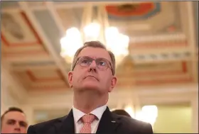  ?? (AP/Peter Morrison) ?? Democratic Unionist Party leader Jeffrey Donaldson pauses as he speaks to the media Monday at Parliament Buildings, Stormont, Belfast.