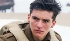  ?? MELINDA SUE GORDON/WARNER BROS. PICTURES/TNS ?? Dunkirk, featuring Fionn Whitehead, was filmed mostly with a 24-kilogram Imax camera to achieve higher image quality and crispness.