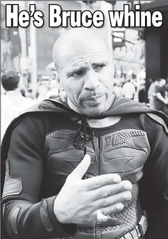  ??  ?? ‘CAPER’: Times Square “Batman” José Escalona-Martinez, who defended costumed panhandler­s at City Hall, was charged with robbing a tourist (as reported in The Post).