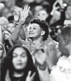  ?? STREETER LECKA/GETTY ?? Patrick Mahomes cheers on his alma mater, Texas Tech, at the Final Four.