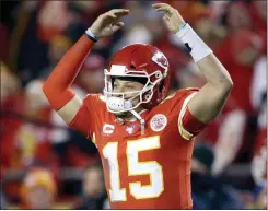  ?? CHARLIE RIEDEL — THE ASSOCIATED PRESS ?? Chiefs quarterbac­k Patrick Mahomes celebrates in the final moments of an divisional playoff football game against the Texans, Sunday in Kansas City.
