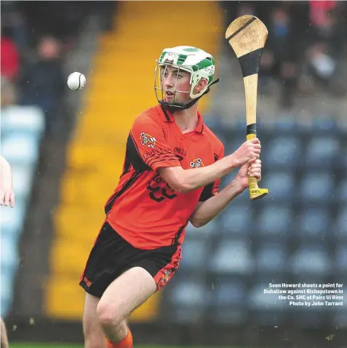  ??  ?? Sean Howard shoots a point for Duhallow against Bishopstow­n in the Co. SHC at Pairc Uí Rinn Photo by John Tarrant