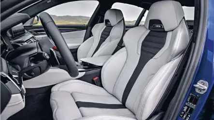  ??  ?? Apart from the standard M seats you can order racing-style ‘M multifunct­ion’ seats with integrated headrests.
