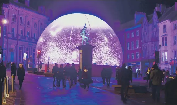  ??  ?? I Love Durham, a giant multicolou­red snow globe in Market Place.