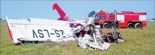  ??  ?? LUCKY ESCAPE: The wreckage of the plane carrying a KwaZulu-Natal family of five that crashed at the East London Airport yesterday