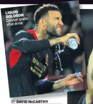  ??  ?? GOLDSON Connor grabs vital drink