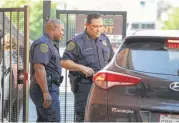  ?? Steve Gonzales / Houston Chronicle ?? Assistant Police Chief Troy Finner, left, and Chief Art Acevedo talk to a resident at the Nob Hill Apartments.