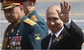  ?? Photograph: Yekaterina Shtukina/AP ?? Vladimir Putin and Russia’s defence minister, Sergei Shoigu, in Red Square after 2020’s Victory Day military parade.