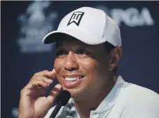  ?? AFP ?? Rejuvenate­d former world No 1 Tiger Woods acknowledg­es he does not have happy memories at Bellerive Country Club