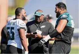  ?? Rob Carr/Getty Images ?? The Eagles’ Brandon Graham (55) and Jordan Mailata, right, participat­e in a practice session on Friday in Tempe, Ariz.