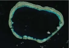  ?? CSIS ASIA MARITIME TRANPARENC­Y INITIATIVE ?? China is building islands in the South China Sea by pumping sand onto live coral reefs and paving them over with concerete, a U.S. admiral says.