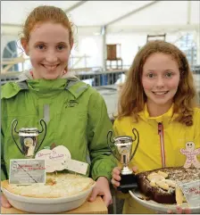  ??  ?? Doireann and Sadhbh Ní Chonchúir, Baile an Ghóilín, with their prize-winning entries in the children’s bakery section at the West Kerry Show on Sunday. Photo by Declan Malone