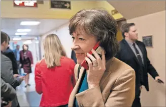  ?? [J. SCOTT APPLEWHITE/THE ASSOCIATED PRESS] ?? Sen. Susan Collins, R-Maine, arrives in the Senate, where she voted for a resolution to annul President Donald Trump's declaratio­n of a national emergency at the southwest border, Thursday on Capitol Hill in Washington.