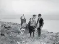  ??  ?? Lewis Hine (ca. 1874-1940), Boys Picking over Garbage in “the Dumps”, Boston, 1909. Photograph, 5 x 7 in. National Archives. 1912.