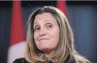  ?? SEAN KILPATRICK THE CANADIAN PRESS ?? Foreign Affairs Minister Chrystia Freeland speaks to reporters in Ottawa on Monday about the new USMCA.