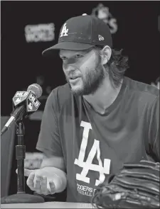  ?? MARK J. TERRILL/AP PHOTO ?? Dodgers pitcher Clayton Kershaw speaks during a press conference on Friday at Los Angeles.