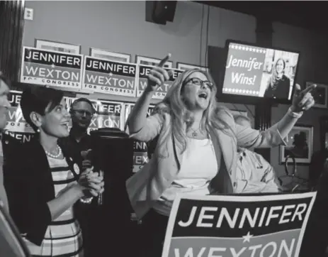  ?? Jahi Chikwendiu, The Washington Post ?? Virginia state Sen. Jennifer Wexton reacts in Sterling after winning the Democratic nomination for Virginia’s 10th Congressio­nal District on Tuesday.