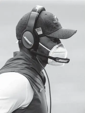  ?? JENNIFER STEWART/AP ?? Dolphins coach Brian Flores looks on during his team’s win over the Cardinals on Sunday.