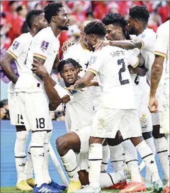  ?? ?? Ghana Black Stars players celebratin­g one of the goals in the 3-2 win over Korea yesterday in Qatar