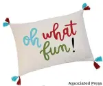  ?? Associated Press ?? ■ An Opalhouse toss pillow, available at Target.