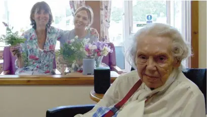  ??  ?? RMBI Home Lord Harris Court resident, Margaret Bradley is reunited with her daughter, Meriel, and her granddaugh­ter Hannah, in the Home’s new visitor room