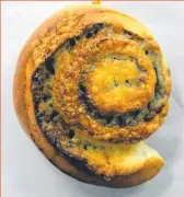  ??  ?? VEGEMITE SCROLLS
This is an old favourite you can pick up from a local supermarke­t or bakery.