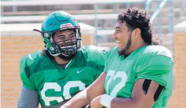  ?? COURTESY OF UNIVERSITY OF NORTH TEXAS ?? Brothers Sosaia Mose, left, and Manase Mose have enjoyed playing together for the Mean Green. They will be facing Utah State on Saturday in the New Mexico Bowl.