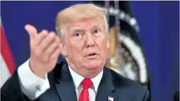  ?? NICHOLAS KAMM/GETTY IMAGES ?? This file photo taken on August 10, shows U.S. President Donald Trump during a security briefing at his Bedminster National Golf Club in New Jersey. Trump once again upped the ante in his war of words with North Korea, warning Pyongyang that the U.S....