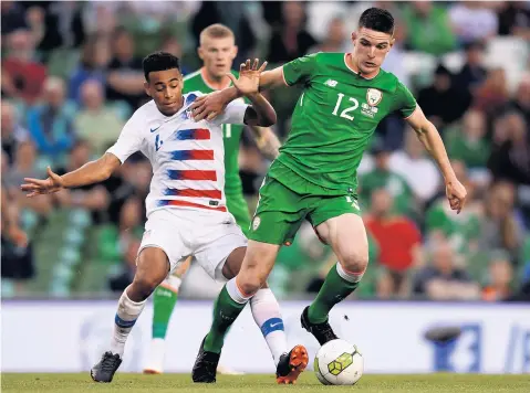  ??  ?? Irish start: Declan Rice (right and below) plays against the United States in June