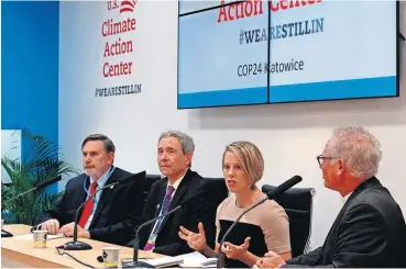  ?? [AP PHOTO] ?? Ashley Allen, Climate and Land Senior Manager at Mars Incorporat­ed, second from right, speaks Friday at the launch of the U.S. Climate Action Center in Katowice, Poland. Others on the podium are, from left, William Somplatsky-Jarman, Patrick Hamilton and Marc Andrus.