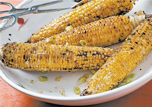  ?? DEB LINDSEY/FOR THE WASHINGTON POST ?? Use a savory, nutty miso butter to transform grilled corn.
