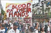  ?? FACUNDO ARRIZABALA­GA/EPA ?? Protesters march toward Grenfell Tower where a fire gutted a huge housing block, killing at least 30 people.