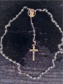  ??  ?? The rosary that belonged ot Patricia Nugent’s mother.