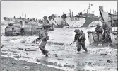  ?? WIKIMEDIA COMMONS ?? British commandos on Jig Green beach during the invasion of
■
Normandy in France on June 6, 1944.