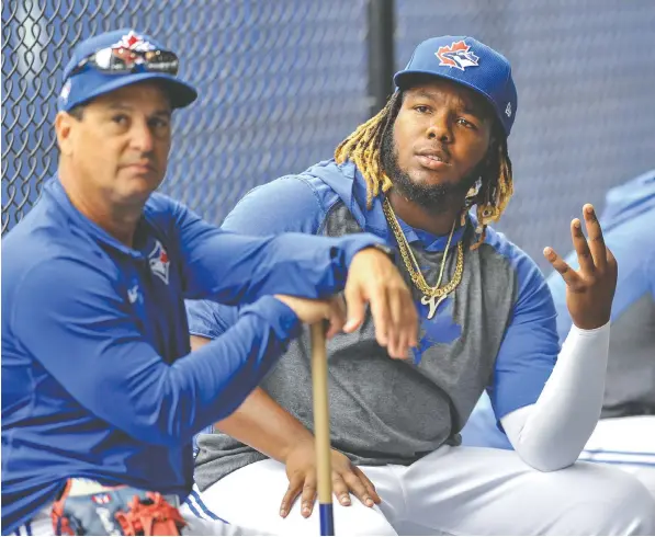 ?? THE CANADIAN PRESS FILES ?? How Blue Jays manager Charlie Montoyo, left, uses his young stars, such as third baseman Vladimir Guerrero Jr., could make the Jays a formidable squad in the 60-game season where one modest winning streak could put a team into playoff contention.