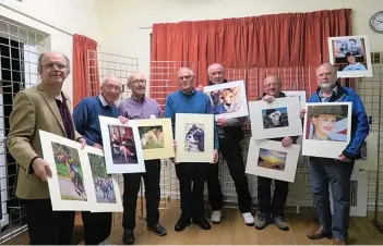  ??  ?? Dawlish and Teignmouth Camera Club Coloured Print Winners from left Judge Peter Hyett holding Paul Hepple’s winning images, Tony Wilson, Peter Sillifant, Ken Redshaw, Stuart Houghton, Howard Sheard, Barry Holmes