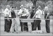  ?? AP/New Haven Register/ARNOLD GOLD ?? Emergency personnel respond to more than 30 overdose reports Wednesday in a historic downtown park in New Haven, Conn.