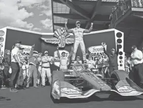  ?? MIKE DINOVO/USA TODAY SPORTS ?? Alex Palou celebrates Saturday after winning the Sonsio Grand Prix at the Indianapol­is Motor Speedway Road Course. The race was Palou’s first points-paying victory of 2024.