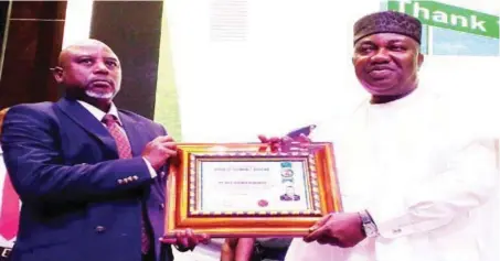  ??  ?? Chairman of Code of Conduct Bureau (CCB), Prof. Mohammed Isah (left); and Governor of Enugu State, Hon. Ifeanyi Ugwuanyi, during the handover of certificat­e to the governor for participat­ion at the CCB’s workshop on strict compliance with assets declaratio­n and code of conduct for public office holders, held in Enugu…yesterday