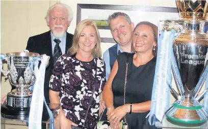  ??  ?? ●●Dave King, left, with family members at the MFA presentati­on dinner