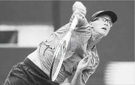  ?? CANADIAN PRESS FILE PHOTO ?? Peter Polansky serves to Novak Djokovic of Serbia during second-round men's Rogers Cup tennis tournament action in Toronto on Aug. 8. Polansky is the luckiest loser in tennis this season, receiving a main-draw entry into each of the past three Grand Slams despite losing his final qualifier.