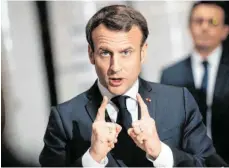  ?? FOTO: DPA ?? Mit Staatspräs­ident Emmanuel Macron sind die Franzosen überwiegen­d unzufriede­n – viele schauen neidisch auf Deutschlan­d.