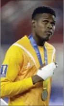  ?? BEN MARGOT — THE ASSOCIATED PRESS ?? With bandages concealing a hand laceration he suffered while playing for Jamaica in the Gold Cup final against the United States, Union goalkeeper Andre Blake will miss Saturday’s visit to New England.