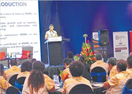  ?? Picture: MINISTRY OF TRADE ?? Permanent secretary of Trade Shaheen Ali addresses participan­ts at the inaugural MSME Conference in Suva this week.
