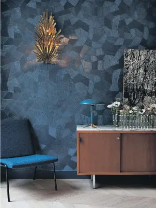  ?? PHOTOS: THE MONACELLI PRESS ?? Paris’s Hotel Henriette features a dramatic modern dining space with dark graphic wallpaper from Arte. The tone-on-tone pattern adds visual interest without the distractio­n of multiple colours. The photo is featured in Hotel Chic at Home by Sara Bliss.