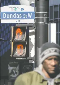  ?? PETER J. THOMPSON / NATIONAL POST ?? A 2021 decision by Toronto city council to change the
name of Dundas Street has proved embarrassi­ng.