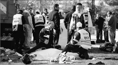  ?? Reuters ?? Israeli rescue forces at the scene of the truck-ramming incident in Jerusalem on Sunday.