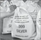 ??  ?? Q SILVER HITS ROCK BOTTOM: Everyone’s scrambling to get the Silver Vault Bags each loaded with 10 solid .999 pure Silver State Bars before they are all gone. That’s because the standard State Minimum set by the private Federated Mint dropped 42%, going from $50 per bar to just $29, which is a real steal.