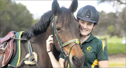  ??  ?? BEST FRIENDS: Horsham’s Morgan Lane and her horse Izzie. Morgan has been picked to represent Australia in Pony Club competitio­n in China. Picture: PAUL CARRACHER